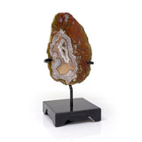 Agua Nueva Agate Geode on a Custom Black Square Stand with Trapezoidal Designs - Gray & Beige with a Small Druze Pocket