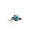 Rare Earth Gallery oval larimar ring featuring a cambered cabochon stone set in a polished 925 sterling silver bezel.