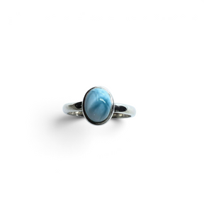 Rare Earth Gallery oval larimar ring featuring a cambered cabochon stone set in a polished 925 sterling silver bezel.