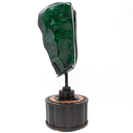 View of Freeform Polished Malachite on Rotating Round Custom Stand - Natural Crevasse in Wedge and Striking Eye Patterns with 2 -Tone Copper Cog Design