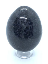 View of Indigo Gabbro Egg aka Merlinite on Lucite Stand