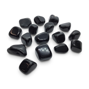 Rare Earth Gallery tumbled black obsidian stones from Mexico with a smooth, polished finish on a white background.