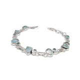 View of Aquamarine Link Bracelet - Rough Nuggets & Oval Cabochons with Faceted Blue Topaz Ovals - 925 Sterling Silver Bezels & Links