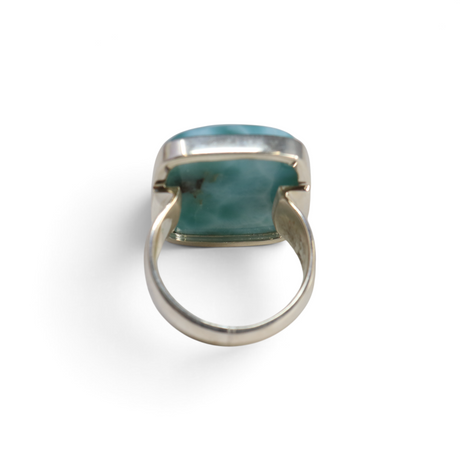 Larimar ring with rectangular cabochon in sterling silver, rear view showing teal stone and open band