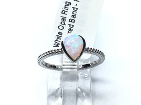 View of White Opal Ring with Textured Band - Pear Shape Sz6