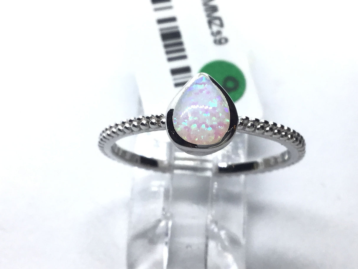 View of White Opal Ring with Textured Band - Pear Shape Sz9