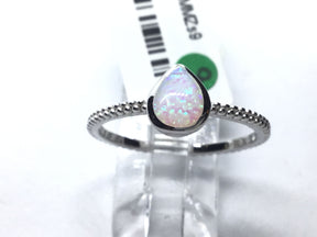 View of White Opal Ring with Textured Band - Pear Shape Sz9