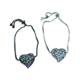 Rare Earth Gallery Nano Stone Asymmetrical Heart Bracelets in black and silver with multi-colored gemstone accents.