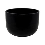 Glossy black 10-inch gem-infused quartz crystal singing bowl, angled side view