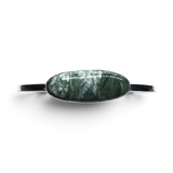 Rare Earth Gallery seraphinite twist bracelet featuring an elongated east-west oval cabochon in a silver bezel setting