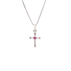 View of Faceted Ruby Pendant - Dainty 925 Sterling Silver (Rhodium Plated) Cross with Prong Set Round in Center & Silver Beaded Edge