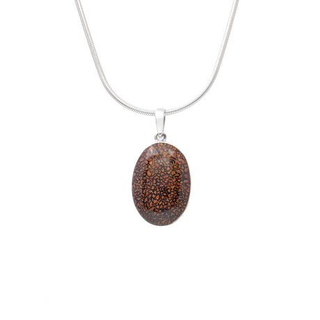 View of Dinosaur Bone Fossil Pendant - Oval Cabochon with 925 Sterling Silver Bezel