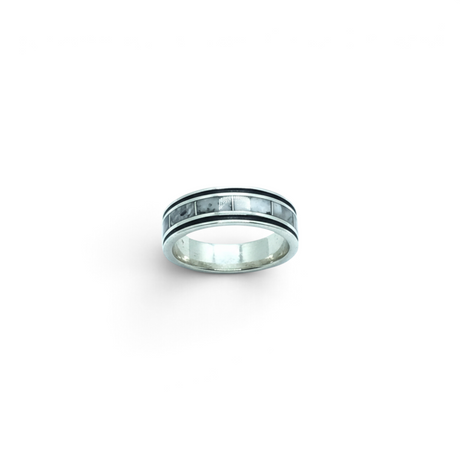 Rare Earth Gallery sterling silver ring featuring a rectangle infinity inlay of white Howlite with oxidized edges.