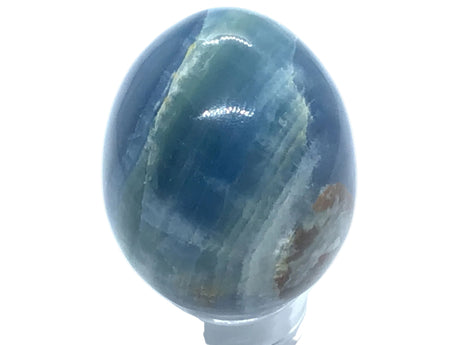 View of A+ Argentinian Blue Calcite Egg with Lucite Ring Stand