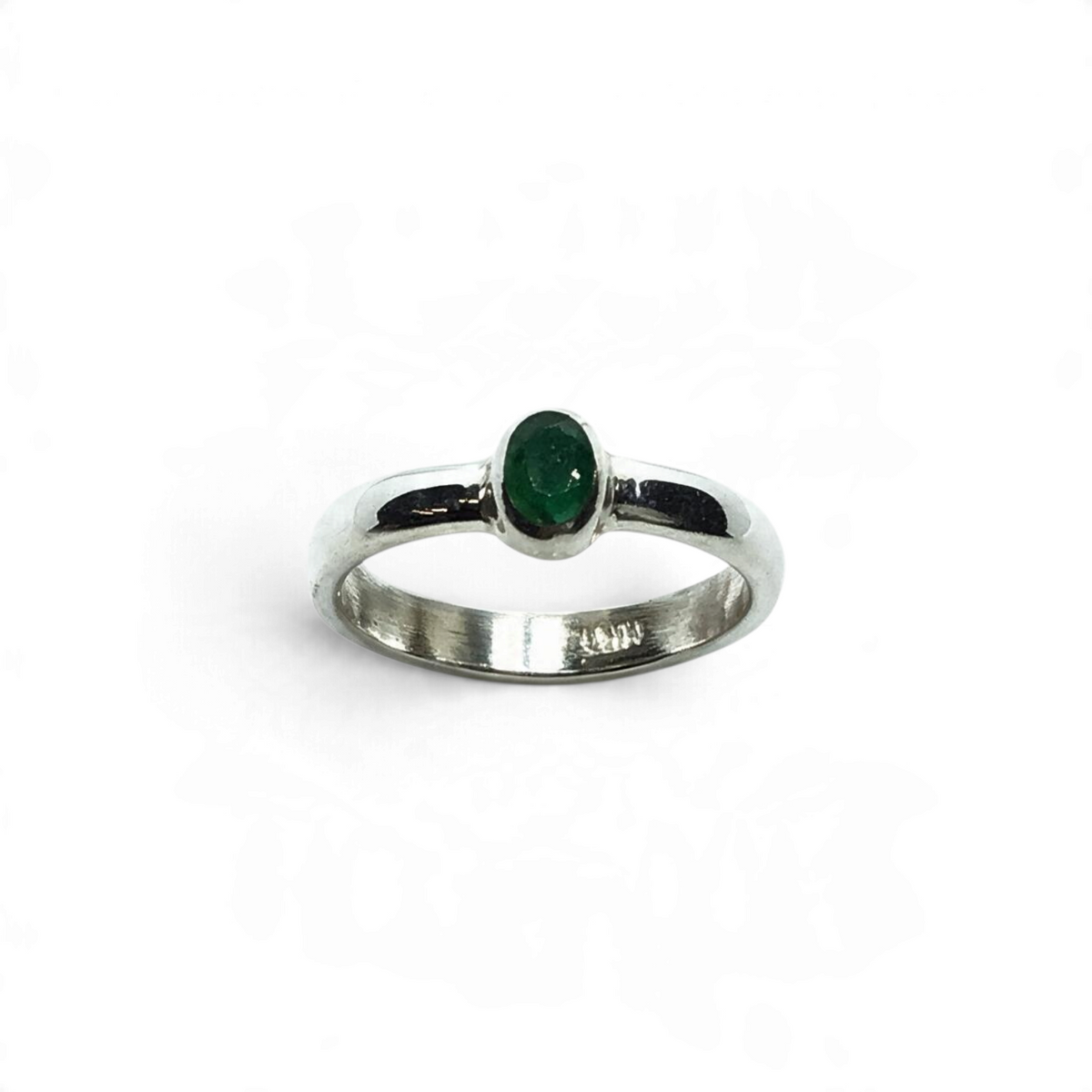 Rare Earth Gallery emerald ring featuring a faceted oval stone in a simple silver bezel setting, size 6.5.