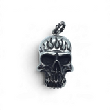 Rare Earth Gallery stainless steel skull pendant featuring a flame-inspired saw blade design on the forehead