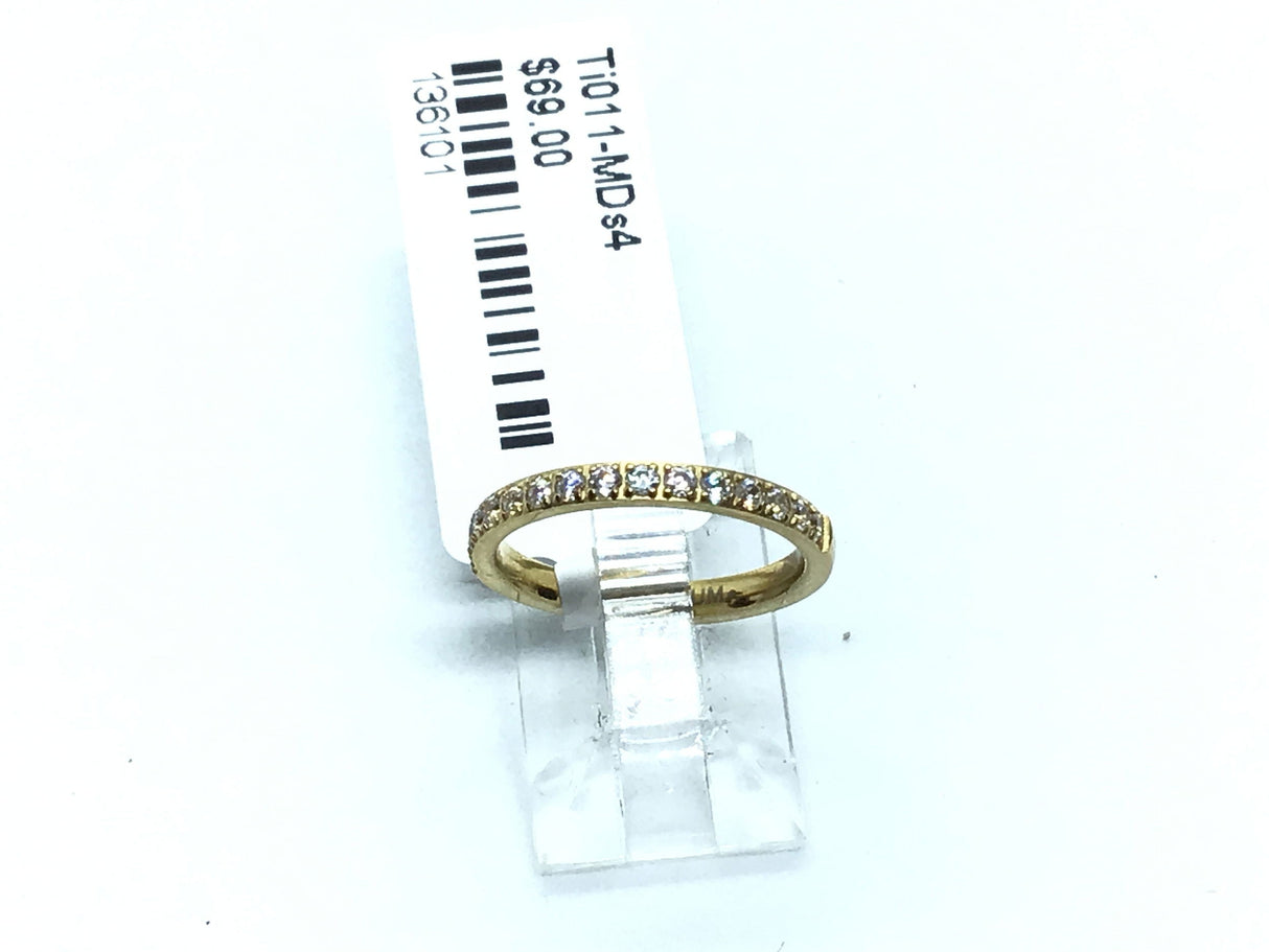Slim gold titanium band with white cubic zirconia pave across half the band