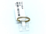 Slim gold titanium band with white cubic zirconia pave across half the band