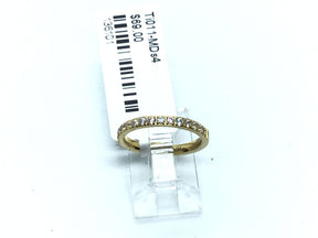Slim gold titanium band with white cubic zirconia pave across half the band