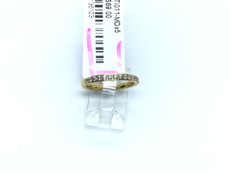 Slim gold-tone titanium ring pave-set with white cubic zirconia across the top half