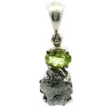 View of Campo De Cielo Meteorite Pendant - Meteorite Rough Prong Set Below Faceted Peridot Oval Prong Set in 925 Sterling Silver