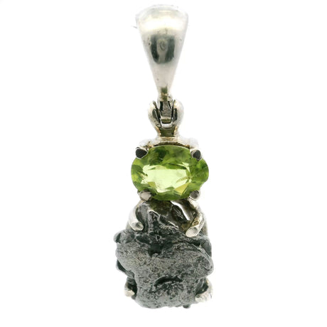 View of Campo De Cielo Meteorite Pendant - Meteorite Rough Prong Set Below Faceted Peridot Oval Prong Set in 925 Sterling Silver