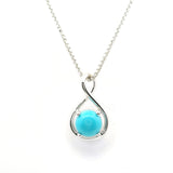 View of New Mexican Turquoise Necklace- Dainty Round Cabochon Prong Set in North\/South Infinity in 925 Sterling Silver with Chain