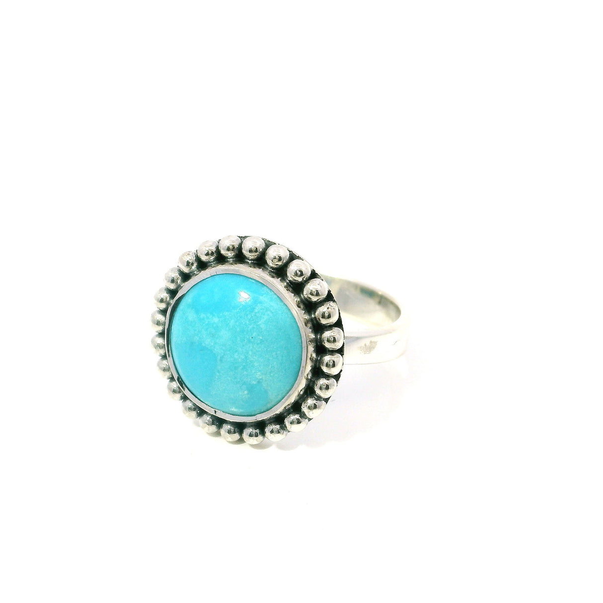 View of New Mexican Turquoise Ring - Round Cabochon with Tan Inclusions Bezel Set with Beaded Edge in 925 Sterling Silver sz8
