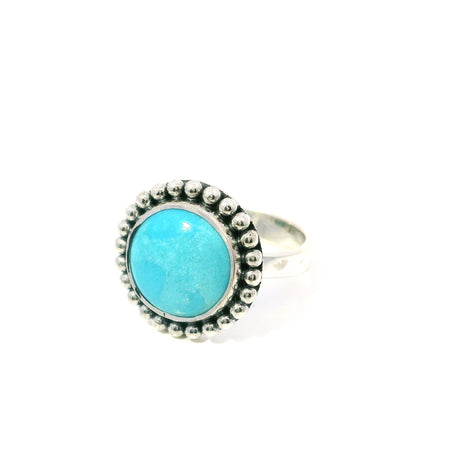 View of New Mexican Turquoise Ring - Round Cabochon with Tan Inclusions Bezel Set with Beaded Edge in 925 Sterling Silver sz8