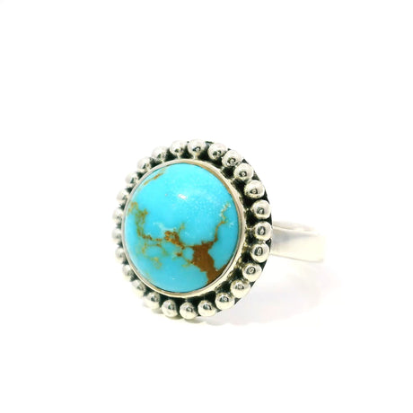 View of New Mexican Turquoise Ring - Round Cabochon with Tan Inclusions Bezel Set with Beaded Edge in 925 Sterling Sivler sz7