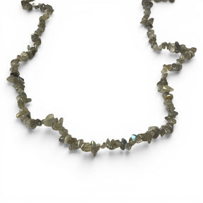 Necklace made of small, irregularly shaped labradorite stones on a white background