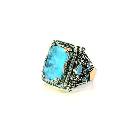 View of Aquamarine Ring - Faceted Rectangle with Single Row Pave Turquoise Nanostones & 2 Faceted Turquoise Side Ovals & Scroll Accents Fancy Prong Set in 925 Sterling Silver with Gold Vermeil Accents sz11.75