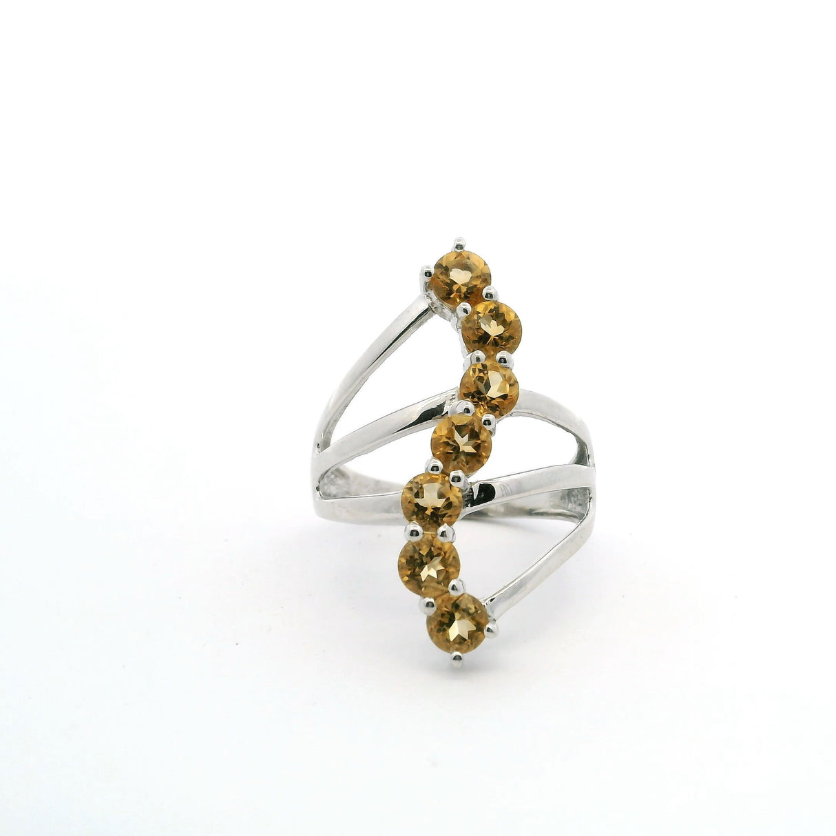 View of Citrine Ring - 7 Faceted Rounds in S-Shaped Design on Triple Band Prong Set in 925 Sterling Silver sz8