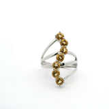 View of Citrine Ring - 7 Faceted Rounds in S-Shaped Design on Triple Band Prong Set in 925 Sterling Silver sz8