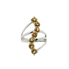 View of Citrine Ring - 7 Faceted Rounds in S-Shaped Design on Triple Band Prong Set in 925 Sterling Silver sz8