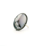 View of Dendritic Opal Ring - Oval Cabochon with Light Gray Section with Rope Accent Bezel Set in Simple 925 Sterling Silver sz7