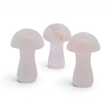 Three pale pink rose quartz mushroom carvings about 1 inch tall