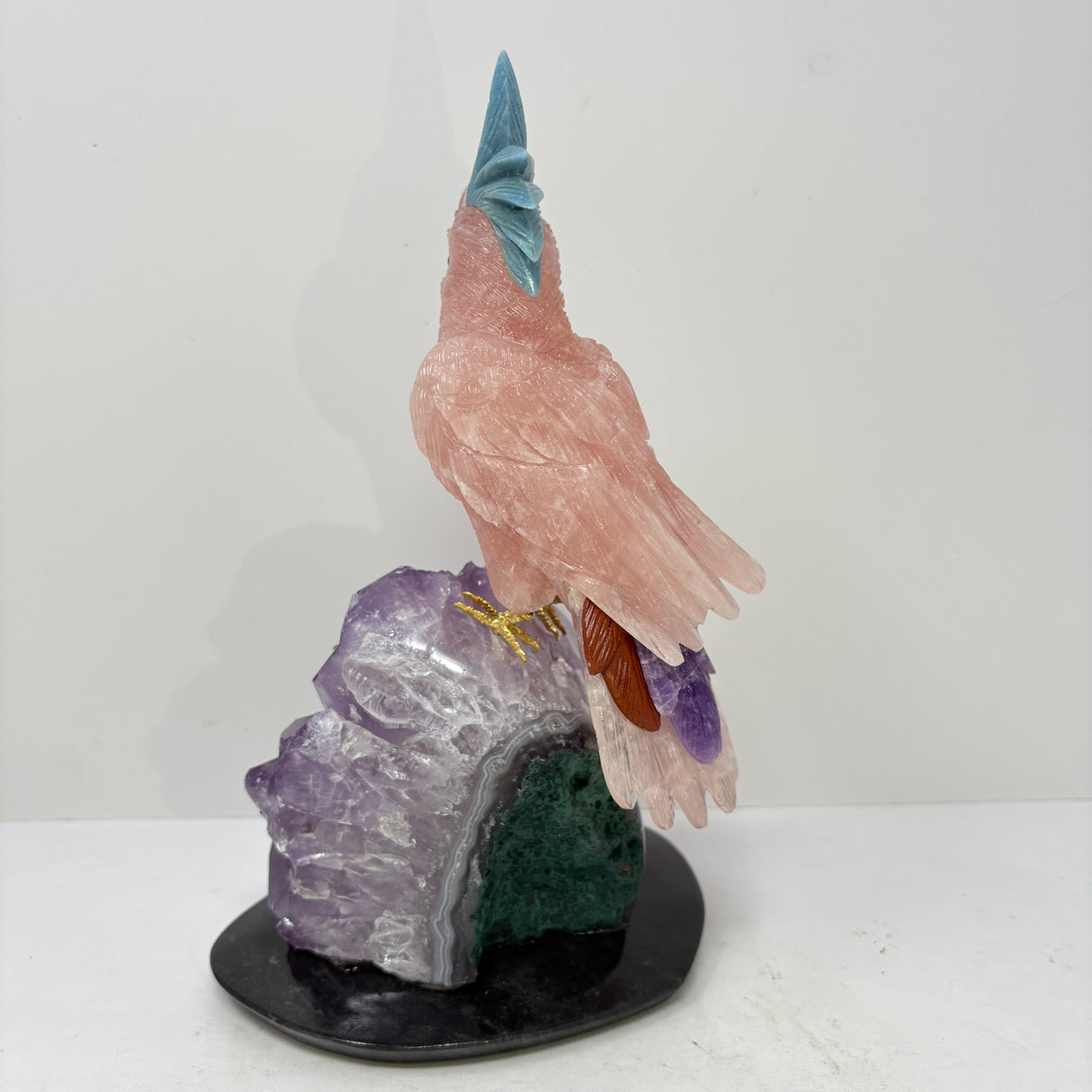 Rose Quartz Cockatoo Carving with Blue Quartz Crest Perched on Amethyst Crystal Cluster with Black Marble Base