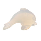 Opalite dolphin carving in milky translucent stone, leaping pose facing left