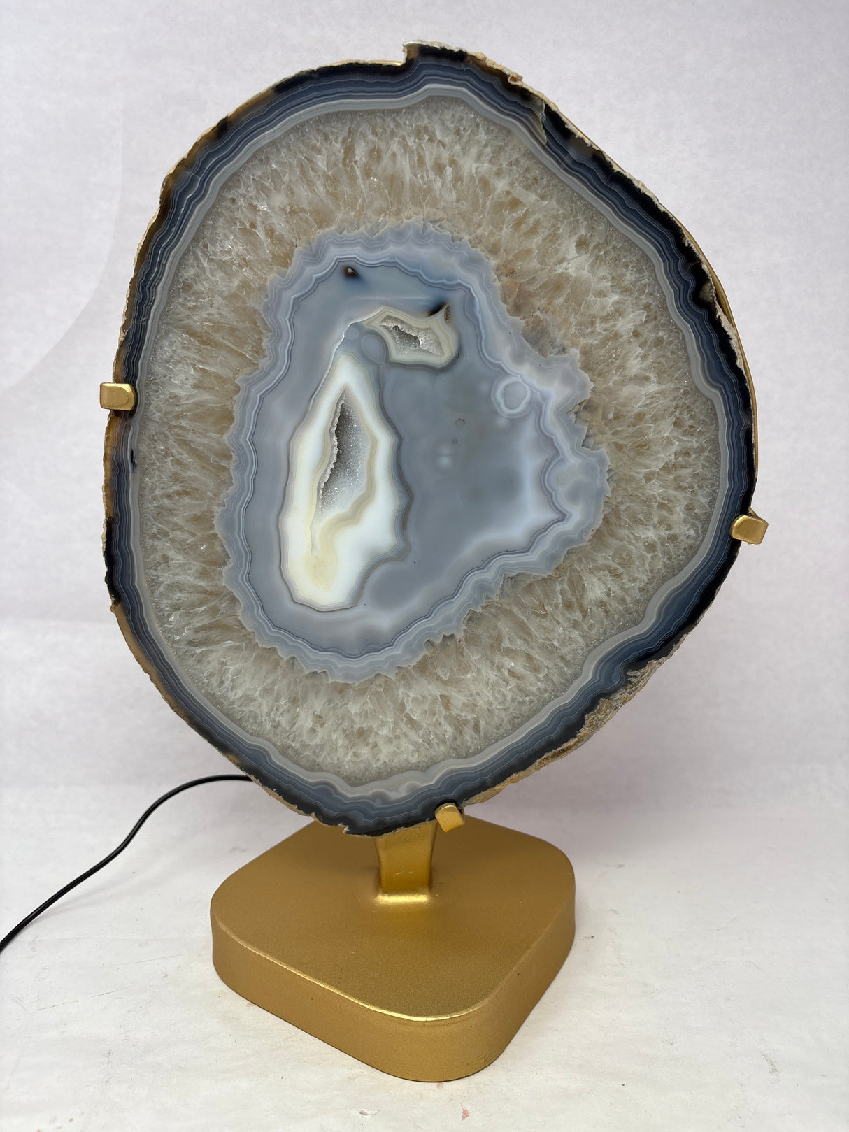 Blue Agate Druze Slice with Blue & Cream Center On Illuminated Table Stand - Gold