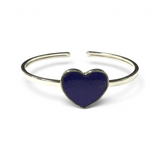 Rare Earth Gallery lapis lazuli heart bangle bracelet with a polished silver bezel and twist band design.