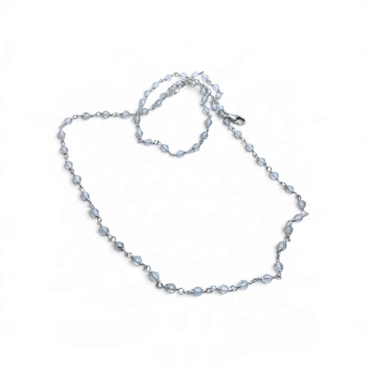 Rare Earth Gallery 18-inch necklace featuring delicate quartz crystal beads on a fine silver chain.