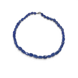 Rare Earth Gallery necklace featuring polished, rectangle-shaped dyed blue agate tumbled stones on a silver clasp.