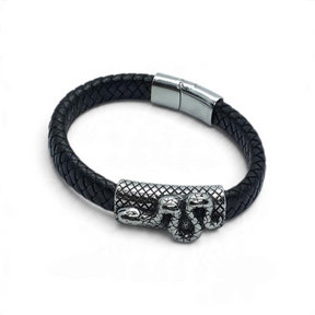 Rare Earth Gallery black braided leather bracelet featuring a stainless steel snake slider and magnetic clasp.