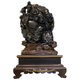 A++ gold sheen obsidian Happy Buddha sculpture on a carved wooden base with intricate detailing and a glossy finish.