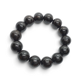 Rare Earth Gallery chondrite meteorite beaded bracelet featuring polished 14 mm round dark grey stone beads