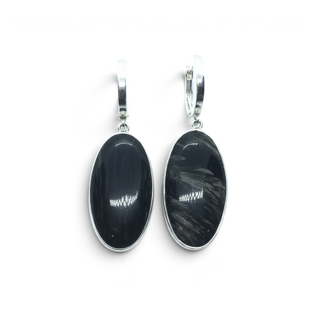 Rare Earth Gallery oval golden seraphinite dangle earrings featuring a polished silver bezel and secure lever back.
