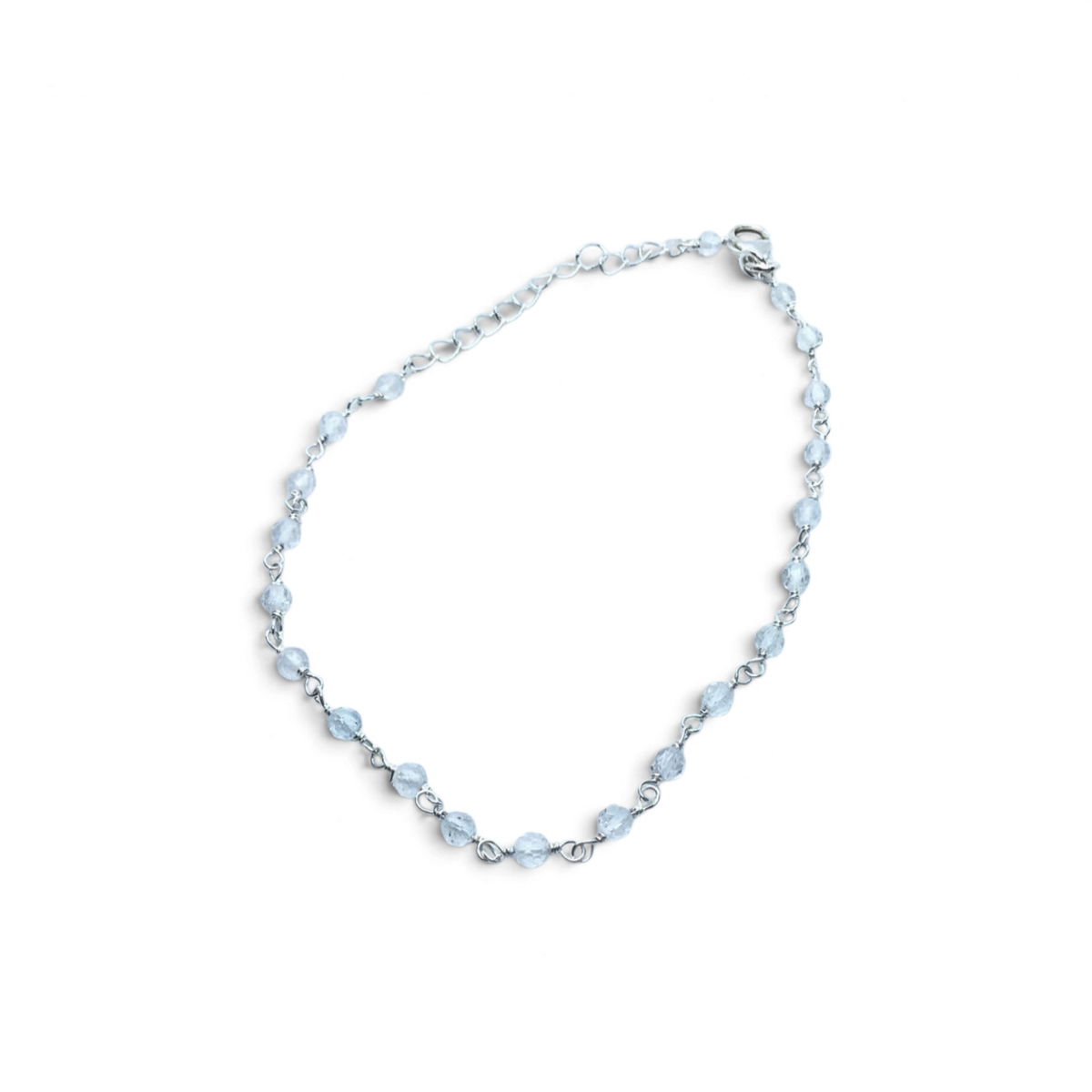 Rare Earth Gallery 8-inch bracelet featuring faceted quartz crystal beads linked by a delicate silver chain