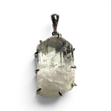 Rare Earth Gallery rhodium plated pendant featuring a clear, prong-set Danburite crystal on a silver-tone bail.