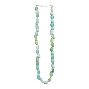 Amazonite necklace of tumbled pale blue-green stones on adjustable chain; flat lay